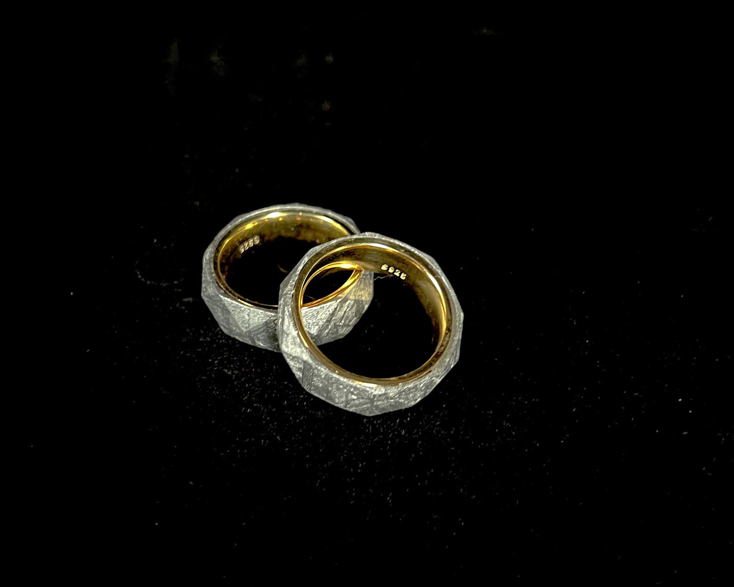 Faceted meteorite band with gold insert